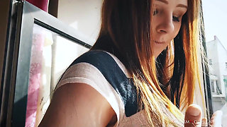 Lea in Sunshine Redhead Babe at the Window