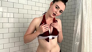 Busty babe playing with her big boobs