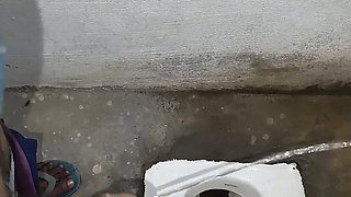 Desi Bhabhi Holding Stepbrother-in-law's Penis and Making Him Pee and Peeing Herself