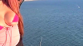 Artemisia Love Wearing Sexy Clothes and Smoking and Flashing Her Big Juicy Boobs in a Perfect Place by the Ocean