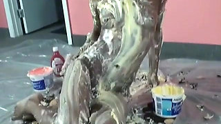 Ebony Anastasia is covered with cream