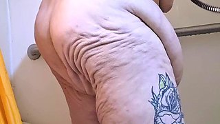 In the Pouring Shower He Devours That Flower