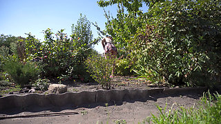 Watching Hot Neighbor Working in Garden