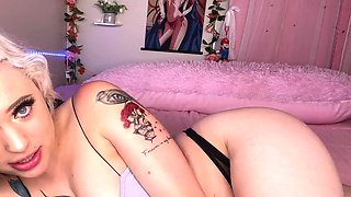 Hot blonde is smoking and masturbating on her webcam