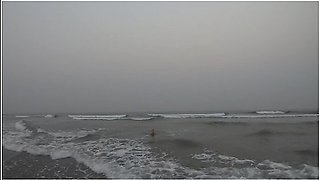 Nude Girl Swimming In The Ocean