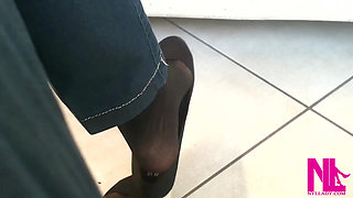 Dangling in Black Flats and Black Nylon Socks