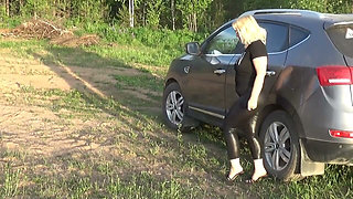 Naked Big Ass in Leather Leggings on a Walk in the Park