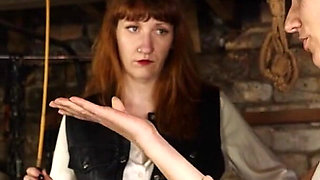 Slave Mila Endures 24 Cold-hearted Hand Caning Strokes From Mistress Roxy