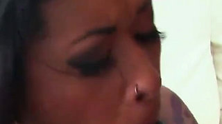 Cute tattooed ebony banged by a big black cock