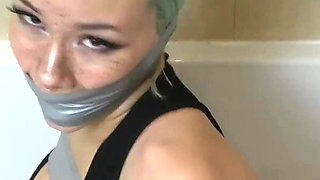 Lilly in: She Got Taped up, Tape Wrap Gagged and Questioned!