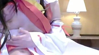 Slender Downer Style Cosplayer Shows Her Quiet Charm While Playing a Reimu Shrine Maiden Role Angle2