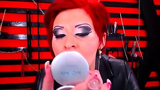 Seductive Redhead Milf Smoking in Latex Boots