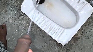 Desi Bhabhi Holding Stepbrother-in-law's Penis and Making Him Pee and Peeing Herself