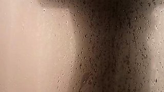 Check out this steamy shower scene with hot naked Simon