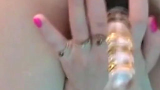 Redhead Amateur MILF with Hairy Pussy Masturbates with a Dildo in the Pool
