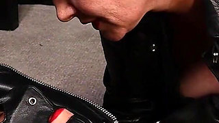 Lady Amber Encases Slave Mila Layers of Leather