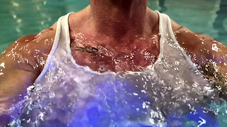 Amazon Kandy Flexes Her Massive Biceps in Her Hotel Pool