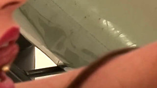 Two Busty Brunettes in Fishnets and Boots Share a Tattooed Stud on the Exam Chair