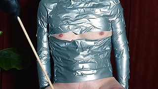 Hardcore Corporal Punishment with Upper Leg Caning and CBT While in Tape Bondage