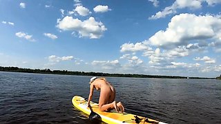 Big-Ass Blonde's Naked Walk on a Paddleboard