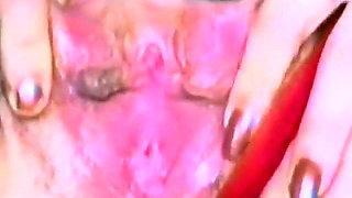 A Small Tits Brunette Gets Busy with Four Dildos