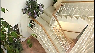 Stunning ebony model with huge bristols takes cock in doggy style on the stairs
