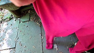 Whipping her ass and vagina on the picnic table