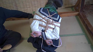 Xr65-a Girl in a School Uniform Had Her Feet Tickled.