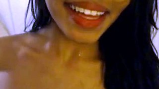Ebony webcam girl deepthroats her dildo