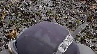 Rubbery Beach Encounter: Lucy's Neoprene Pussy Play with Stranger