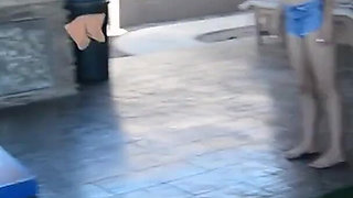 Shey Holmes and two other teens play naked cornhole