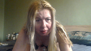 Horny Blonde MILF Masturbates Her Pussy and Ass with a Vibrator Close up.