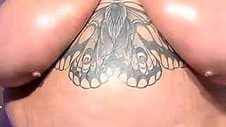 Huge Tits in an Oiled Bikini