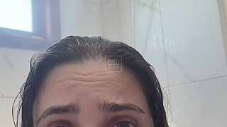 Naughty aunt makes naked call during shower