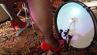 I Play Drums with My New Red Stilleto