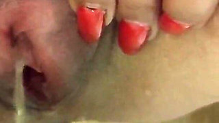 A Hot Brunette Pees in the Bathtub