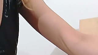 Blonde in Pantyhose Plays with a Glass Toy on the Office Chair