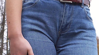 MILF Teasing Her Big Cameltoe in Blue Jeans Outdoors