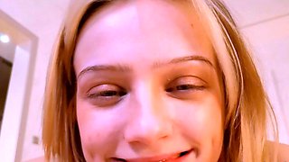 Blonde Looks Back While She Spreads and Toys Herself