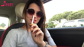 Petra smoking in car