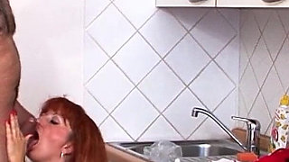 Ginger MILF with hairy pussy lets husband fuck her in the kitchen