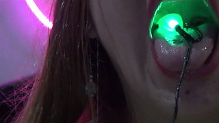 Amazing!! He Has Swallowed a Very Long Cord with Large Bright Green Lights in the Shape of Spiders.