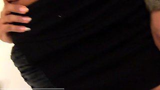 Busty Asian shemale in black skirt strips string panties