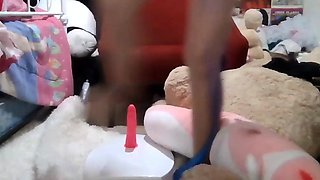 Small titted brunette Sharron with glasses masturbates