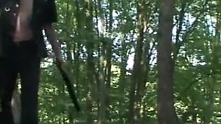 Humiliating whipping kneeling on the lake shore