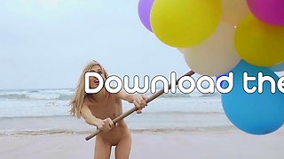 Sexy naked MILF playing with her baloons