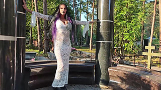 Gothic Witch Wanders the Cemetery, Performs Black Magic Rituals, and Makes You to Worship Her and Satan.