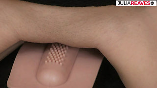 Hottie rubs clit with a sex toy to an orgasm