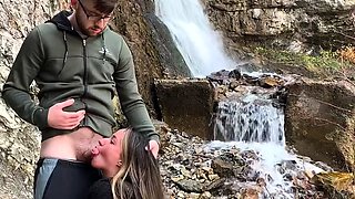 Amazing busty brunette slut doing blowjob outdoor