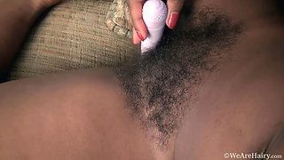 Bobbie Rains Pleasures Herself on Brown Sofa
